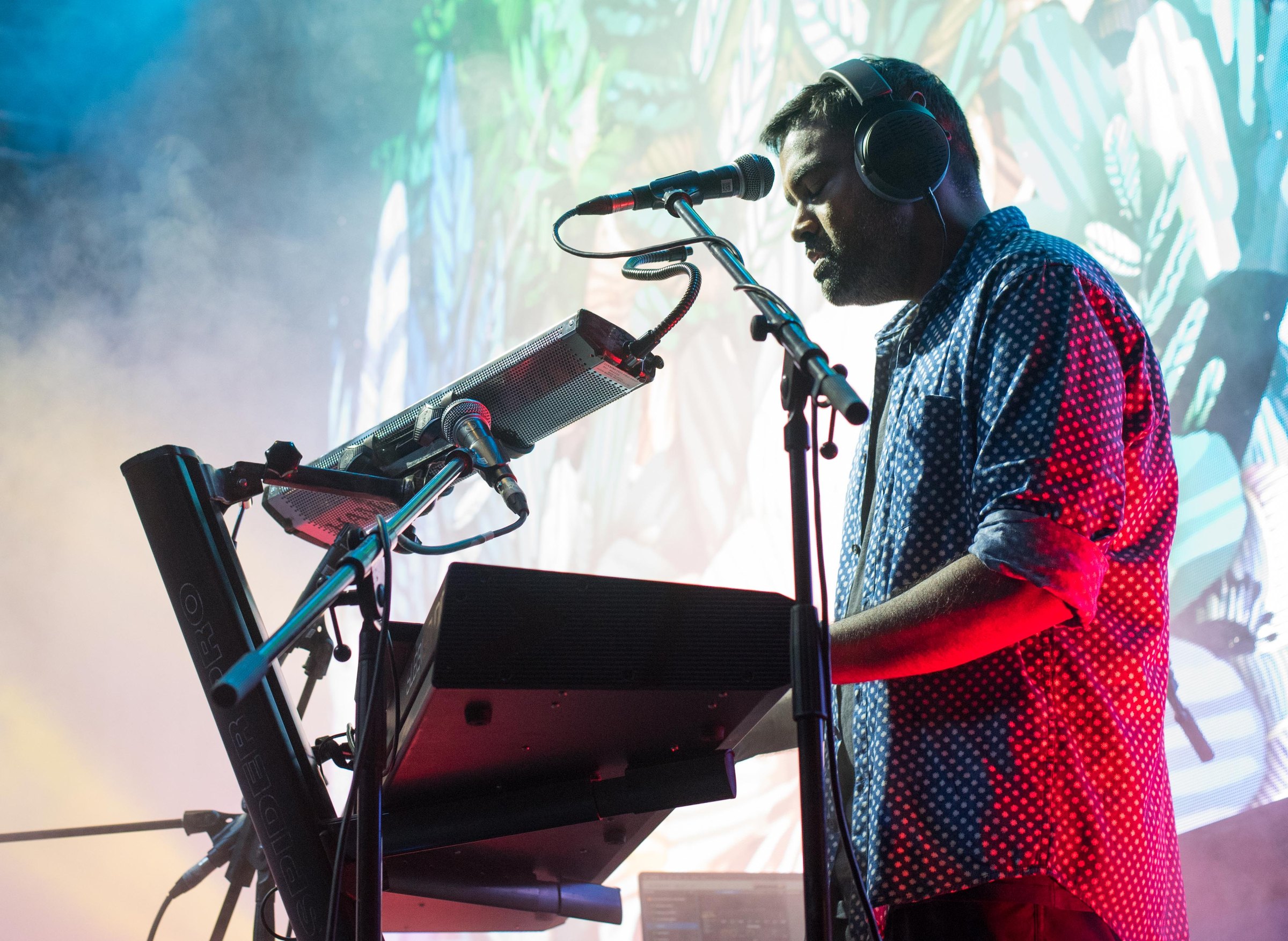Jason Zac performing live with headphones