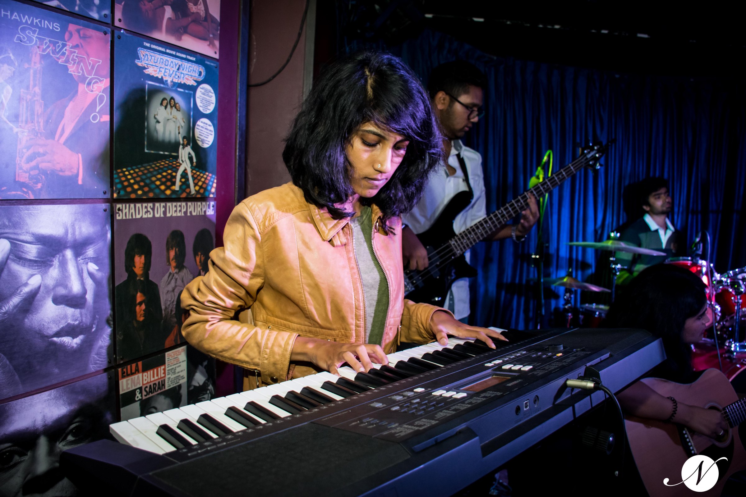 Young keyboardist performing on stage