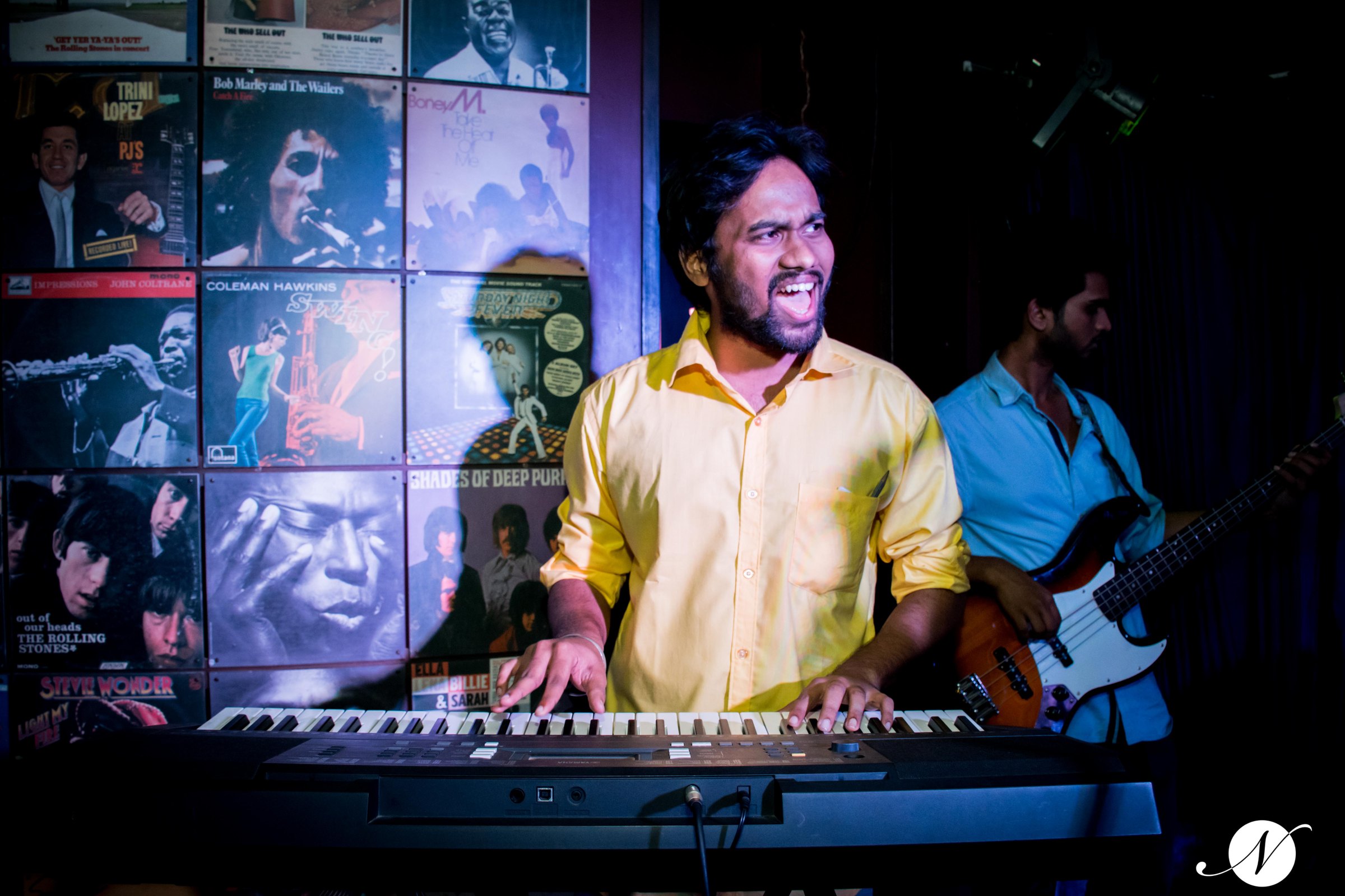 Keyboardist singing while playing