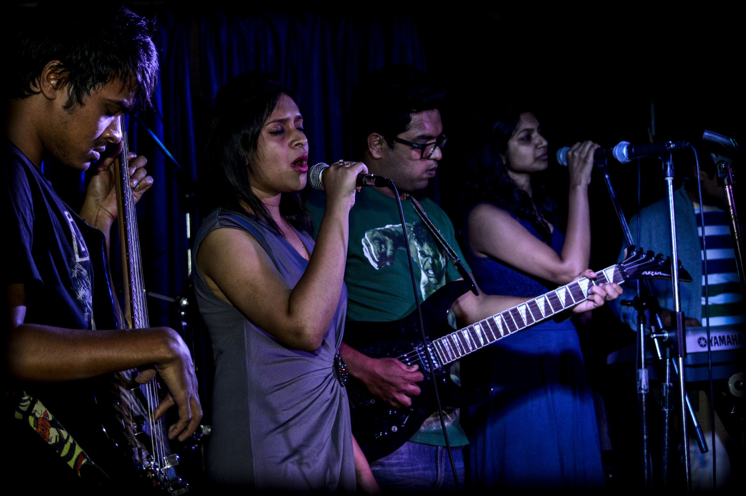 Group of singers and musicians on stage