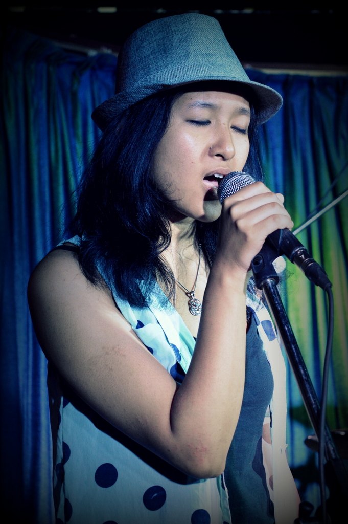 Singer holding a microphone
