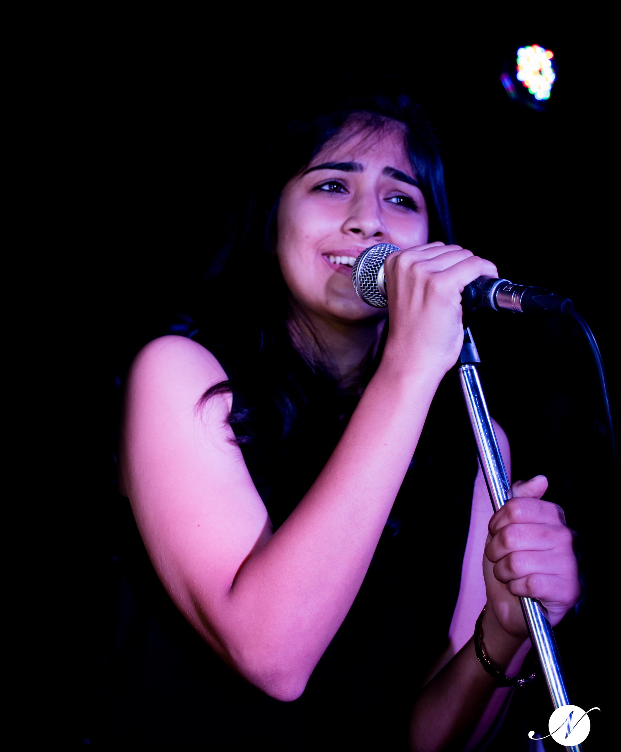 Vocalist singing on stage
